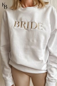 bride sweatshirt, bride sweatsuit, bride sweater, bride sweatsuit wedding day, bride sweatsuit outfit, bride sweatshirt bachelorette parties, bride sweatshirt wedding day, bride sweater wedding, bride sweater sweatshirt, wifey sweatshirt, wifey sweater, wifey sweatshirt outfit, wifey sweatshirt DIY, honeymoon outfit, honeymoon ideas, hen part outfit, bride hen party outfit, bride hen party sweatshirt