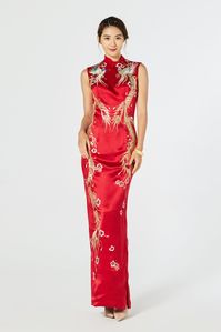 This traditional red silk qipao is a symbol of new beginnings and renewal. The phoenix is a mythical and majestic bird that’s iconic in Asian culture. Rock this phoenix embroidered cheongsam dress for your wedding or tea ceremony.  #cheongsam #qipao #teaceremonydress #chinesedress #chineseweddingdress #moderncheongsam #modernqipao #teaceremony #sheathcheongsam #sheathqipao #phoenixanddragon #traditionalqipao #eastmeetsdress