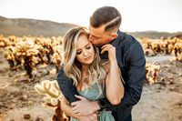 A gorgeous golden hour couples session at Cholla cactus garden in Joshua Tree National Park!