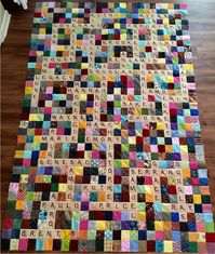 Jan used our exclusive Scrabble tile panel to create this one of a kind quilt about her family.