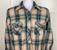 Vintage 70s pullover plaid flannel shirt.  100% acrylic by John Blair. Great condition.  No holes, no stains, no issues. Size M.  Please note measurements to avoid returns: laid flat measures 22.75" across chest (armpit to armpit), 24.5" length (base of collar on back to bottom of shirt), 33" sleeve length (center of base of collar on back to end of sleeve).