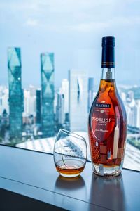 The Martell Noblige Shenzhen City Exclusive edition, the first bottle in the new “Martell City Collection” spotlighting the Shenzhen skyline, is available only in-store at Martell's first-ever boutique, L'Atelier Martell. Please enjoy responsibly.⁠ This material relates to the promotion of alcohol⁠ and should not be viewed by anyone below the ⁠legal age of alcohol purchase in the country of⁠ viewing. cognac, boutique, martell, Shenzhen, China, alcoholic drink, luxury wine and spirit