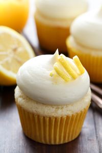 Moist homemade lemon cupcakes topped off with lemon curd cream cheese frosting. A fun and flavorful dessert, perfect for any spring or summer occasion!