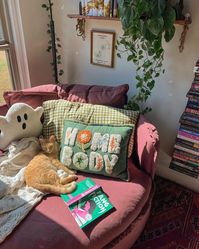 the perfect reading corner doesn’t exi- 🧚🏽‍♀️🍂🎃☕️ guys I love this cozy corner. It’s the perfect size for lounging and reading and naps according to my daughter 😂 I got the @sixpennyhome round daybed in the color summer plum and it’s the perfect pop of color in my room. Thanks to everyone who voted! 🥹 and thank you sixpenny for sending my dream chair over! 💟 update: I am currently in my vampire era and I am enjoying fang fiction! I finished so thirsty & had an amazing time. I have to rea...