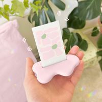 Check out this cute danish pastel polaroid holder! Designed to hold the instax mini polaroids! The perfect addition to your instax mini collection! Pastel photo display, perfect for aesthetic home decor! Polaroid decor! Click the link to buy 💓 Instagram @jakethomasparker #polaroid #aestheyic #pastel #pink