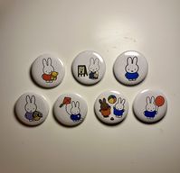 Set of 7 different Miffy pins each holding something or doing something :) Each pin is slightly bigger than a quarter as shown in the second picture!