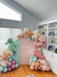 Beach themed baby shower for baby girl. Tuftex Cameo never disappoints. Empowermint, Rosewood and Dusk cream. Seahorse and inflatable star fish