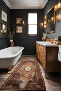 Create a moody vintage bathroom style using dark wall paint colors, wooden vanity, a classic bathtub and a small antique rug on the ground.