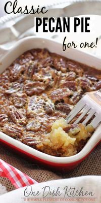 This classic single serving pecan pie has all the flavors you love in a pecan pie. With a buttery shortbread crust and a rich, pecan filled filling, this wonderful dessert is perfect by itself or topped with whipped cream.| One Dish Kitchen | #pierecipes #pecanpie #pecans #pie #onedishkitchen #dessert #singleserving #cookingforone #recipesforone