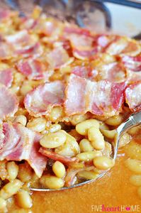 Easy Southern Baked Beans ~ this sweet and savory side dish is topped with bacon, and it's quick to whip up using canned white beans | FiveHeartHome.com