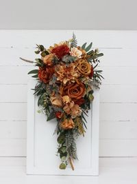 "The bouquet is created from artificial flowers and greenery of high quality. All dimensions are total length or width. Bridal bouquet length 20 \"(50 cm) Width of the bridesmaid bouquet - 10 \" ( 25cm)"