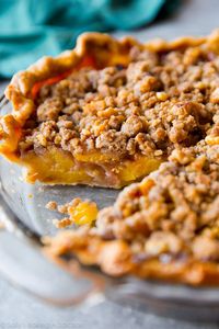 With brown sugar and cinnamon, this peach crumble pie is my favorite. The filling holds its shape and the crust is buttery and flaky! Recipe on sallysbakingaddiction.com