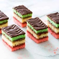 Italian Rainbow cookies are popular at Christmas, when they are called Neapolitan or Venetian cookies, perhaps to denote the colors of the flag of Italy. They are sometimes associated with the Passover holidays (when made with matzo cake meal instead of flour).