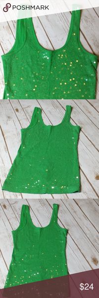 Green tank top with sequins New without tags.  Perfect for Christmas 🎄 or St Patrick's day!   No trades. 💕  Bundle 2 or more items from my closet & save 15% off your purchase! 🎉 Express Tops Tank Tops