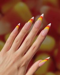 Candy corn at your fingertips. A twist on the most classic French nail, just in time for trick or treating.

Choose your preferred nail shape and length!

Designed by Lailani (@nail.lanii).