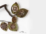 lorenzo durán from guadalajara, spain, creates incredible sculptures out of fallen leaves | 'i was inspired by how a caterpillar was eating a leaf and thought: what if i try to cut out drawings on a leaf?' | collecting leaves from his garden, durán washes, dries and presses them before he starts to sketch out patterns on each one | the intricate designs gradually appear as he gently cuts away the leaves using a sharp knife | his pieces can take anywhere from a week to two months to complete