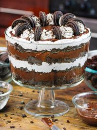 This easy Oreo trifle is the perfect make ahead dessert! It comes together so quickly, and is made with fluffy chocolate cake, crushed Oreos, layers of pudding and whipped cream!