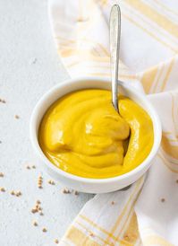 This homemade mustard recipe is surprisingly easy to make with a few simple pantry ingredients! Making prepared yellow mustard is much more flavorful than the squeeze bottle storebought variety. It's guaranteed, that your friends and family will love its flavor and be asking, "Where did you get this great-tasting mustard sauce?" If you have never made homemade mustard now is the time to try. Making gourmet mustard at home is much easier than it sounds and it will keep up to a year in…