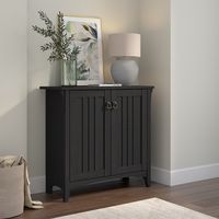 The Bush Furniture Salinas Small Storage Cabinet with Doors offers a practical organization solution that brings a touch of casual style to any residential space.