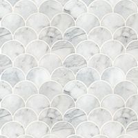 Add a splash of sophistication to your decor with Calacatta Blanco Scallop Polished Marble Mosaic Floor and Wall Tile. It features unique styled pieces of polished white Italian marble, lending an upscale look and contemporary flair to any interior expanse. The high-sheen, smooth-finished genuine stone chips are perfectly arranged on a 12.8 in. x 10.43 in. mesh-backed mosaic. Suitable for residential and commercial use, this ornate tile has a distinct pattern that is certain to inject space-defi