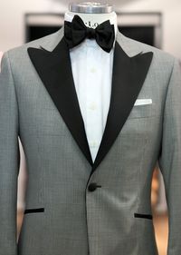 THIS is a tux jacket. Love the wide, contrast peak lapel. Usually not a fan of the single button, but works here.