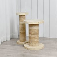 Olin Side Table Set - The Olin set of two travertine side tables takes hints from industrial design. Olin brings a cool, architectural feel to any space. Made from honed beige travertine marble, Olin is the perfect way to warm up your decor as it pairs elegantly with candles, greenery, leather - bound books, or rose - gold accent pieces. With a unique cylindrical tabletop structure, this is a statement piece all on its own.