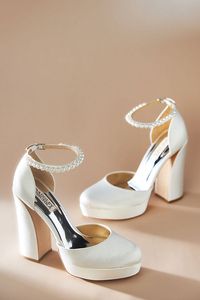 Equal parts playful and daring, this chunky platform heel is finished with a charming pearl-embellished ankle strap. | Felixa Ankle Strap Platform Heels by Badgley Mischka in White, Women's, Size: 10, Satin at Anthropologie