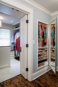 this custom built jewelry cabinet makes use of dead space in the hallway wall