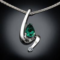 Emerald and white sapphire. Beautiful.