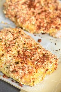 Baked Mahi Mahi. Parmesan Crusted Mahi Mahi is crusted in Parmesan herb coating and easily prepared in the oven and only takes about 10 minutes to prep and 20 minutes to bake. #fish #mahimahi #bakedfish #easydinner