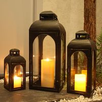 PRICES MAY VARY. Suitable for Most Outdoor Scenes——The set of 3 vintage candle lantern is perfect for outdoor use. The metal material can withstand wind and rain, while the high-quality glass prevents rainwater from getting in and allows you to see the bright, flickering candles, creating a fantastic atmosphere. Inspired Design——The combination of multiple sets adds a variety of possibilities to your home decor. The antique metal paint design combined with black and gold colors make them the per