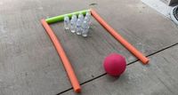 This post was transcribed by a member of the Hometalk editorial team from the original HometalkTV episode.Summer is the perfect time for outdoor games and these hacks will give you hours of sunshiny fun. You can see more of my crazy creations here For the first outside game, you will need to grab some pool noodles.  Take a flag and stick it into the ground.   Next, grab some long bamboo skewers.  Take them out of the package and break them in half.  S…