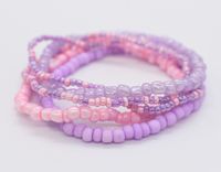 Stretch Bracelet, Gift For Her, Set of 5 Bracelets, Bracelet Stack, Stackable Bracelet, Bead Bracelet, Bracelet Set, Bead Bracelet Set, Stretchy Bracelet, Purple Bracelet, Beaded Stretch Bracelet, Pink Bracelet, Hippie Bracelet You will receive 5 bracelets as pictured in purple and pink.  Stack these together or wear them alone, can be worn in any combination. Beads these are made with * 6/0 seed beads * 11/0 seed beads Bracelets are made standard size which is a size 7". If you need a bigger si