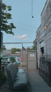 Blue sky, rustic aesthetic, asheville bar, north carolina, green trees,