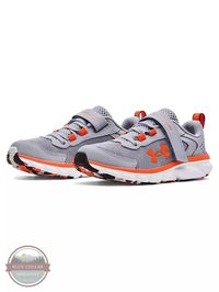 Your ultimate lightweight, do-everything shoe—with soft cushioning for a smooth ride and synthetic overlays for more support. Under Armour 3024635-107 #underarmour #kids #shoes #orange #gray #school #running #play