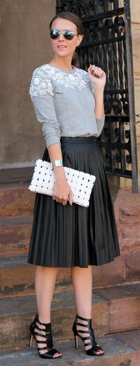 Pleated Faux Leather Midi Skirt in Black