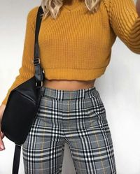 Take a look at these classic black and white gingham trousers with an added flare of mustard yellow! #trousers #gingham #ginghamtrousers #fashion #pants