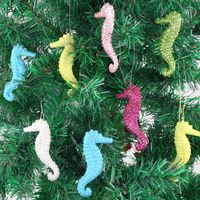 PRICES MAY VARY. Ocean Themed Christmas Ornaments: You will receive 12 pieces of 6-color seahorse Christmas ornaments, decorated with clear fishing wire hanging loops. Rich marine style and romantic rainbow colors create the perfect holiday decoration for your Christmas. Don't miss out on these unique seahorse ornaments for your Christmas tree, beach, or coastal-themed decor. Easy to Hang: Each seahorse measures approximately 3.54 inches long, lightweight and easy to hang, with 3D realistic visi