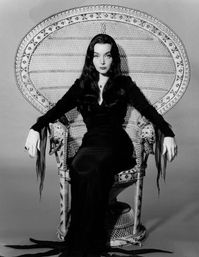 Carolyn Jones as Morticia Addams