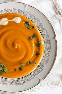 Make a rich and creamy, healthy coconut milk pumpkin soup recipe. This vegan recipe is a savory and healthy fall dinner idea. Reheat leftovers for a quick and easy lunch the next day. Or serve this dairy free soup as a side dish to complement your favorite fall recipes. Pumpkin soup is healthy and delicious! This low-calorie meal is rich in vitamins, minerals and antioxidants and is high in fiber. Made with no added sugar, this vegan pumpkin soup is a wonderful savory dish for autumn eats!