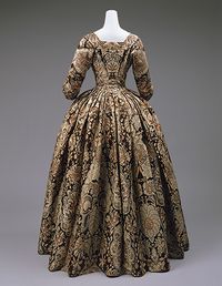 Dress, ca. 1735 British Heavy silk with lace pattern design woven in beige and rust on a dark brown satin ground