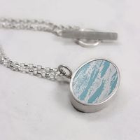 Blue sky cloud anodised aluminium and silver oval pendant necklace | Arrabella Giles