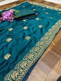 *Price :- 1349+$/-* *SAREE DEATIL* SAREE FABRIC : Soft Dual Tone Vichitra Silk SAREE WORK : Heavy Zari Embroidery Work SAREE STITCH : Along With Piping & Matching BLOUSE FABRIC : Heavy Bangloriy Silk 393