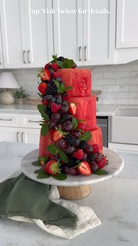 I'm so excited to share this Watermelon Cake! And don't worry, my 2-year-old son and 92-year-old grandmother greatly enjoyed the extra watermelon. They both sat and snacked on it while watching me build this cake made entirely of fruit and topped with more fruit and fresh mint leaves. I secured the watermelon cake with long wooden skewers and attached the fruit with wooden toothpicks. We had a large family gathering with Roger's family that night and cutting it was as simple as slicing and serving. The toothpicks in the fruit can be removed when serving or left in the berries to be used/served as finger food. What's your favorite fruit will you add to your Watermelon Cake this summer?