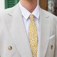 Le Colonel fell in love with this Mustard Liberty Feather Meadow tie! A mustard tie ornate with white flowers. The perfect accessory to complete any outfits!  Sewn and hand-finished with love in our Lille workshop 100% Liberty Cotton 100% Cotton lining