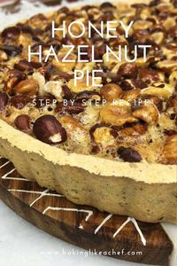 These all year round flavors of honey and toasted hazelnuts combine gorgeously in this easy Honey Hazelnut Pie. You will enjoy its hazelnut filling once you make it. If you are looking for a tasty homemade dessert to delight your dinner guests, this tart is the answer. #pierecipes #hazelnutpie #hazelnuttart #piecrustrecipe #feedthecrowd #partyfoodideas #bakinglikeachef | www.bakinglikeachef.com