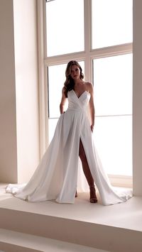 Celebrate your love in this impossibly chic ballgown. Thoughtfully crafted from sumptuous Mikado, this softly structured gown accentuates curves to create a breathtaking silhouette. A sultry thigh split adds a touch of seduction to complete this stunning bridal style.