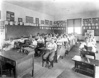 Interior view of a school room, showing children at their desks - Hialeah, Florida