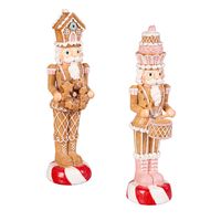 Add a sprinkle of winter wonder to any area with this enchanting LED holiday décor! These nutcrackers may be dressed in gingerbread garb, but they're not your average sweet treat - their headpieces are miniature gingerbread houses and tiered cakes! Light them up for a dose of extra holiday cheer. Perfect for mantels, shelves, or tables, these unique pieces will instantly become a beloved part of your festive decorations. Don't forget to snag a few as gifts for those who adore the holiday season.