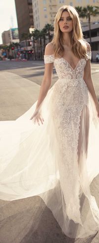 Wedding dress from MUSE by Berta | Romantic Lace fitted Bridal Gown with cold shoulder sleeve and plunging v neckline | Flowy illusion fitted Wedding Gown with spaghetti straps and tulle over skirt | #weddingdress #weddingdresses #bridalgown #bridal #bridalgowns #weddinggown #bridetobe #weddings #bride #weddinginspiration #dreamdress #fashionista #weddingideas #bridalcollection #bridaldress #fashion #bellethemagazine #ido #dress